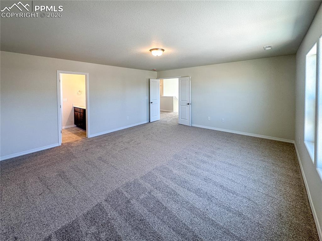 Image 18 of 36: Master Bedroom