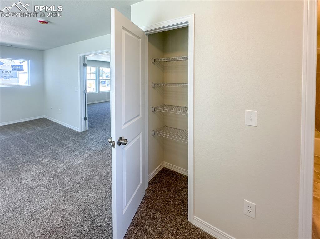 Image 32 of 36: Upstairs linen closet
