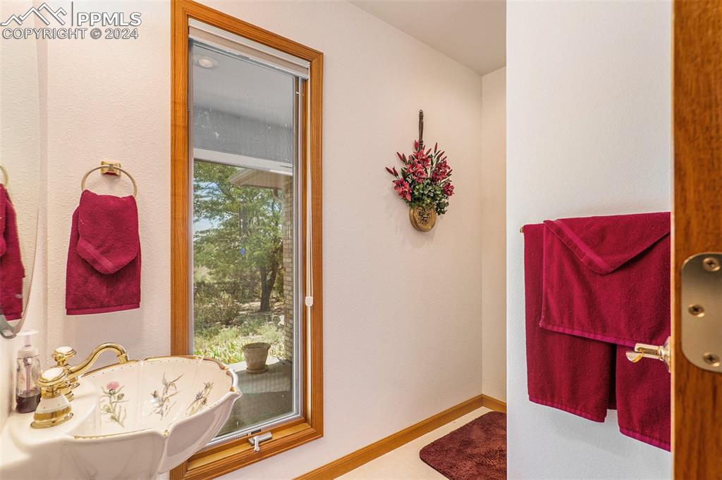 Image 19 of 50: 1/2 Bathroom near Entry way