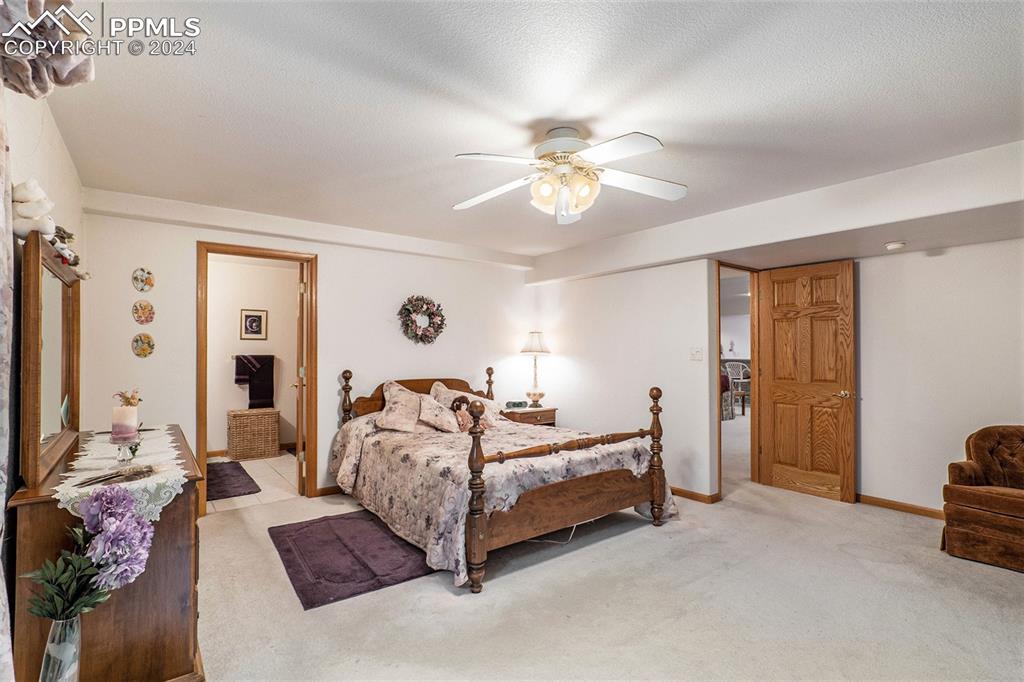 Image 36 of 50: Basement Bedroom w/ Ensuite