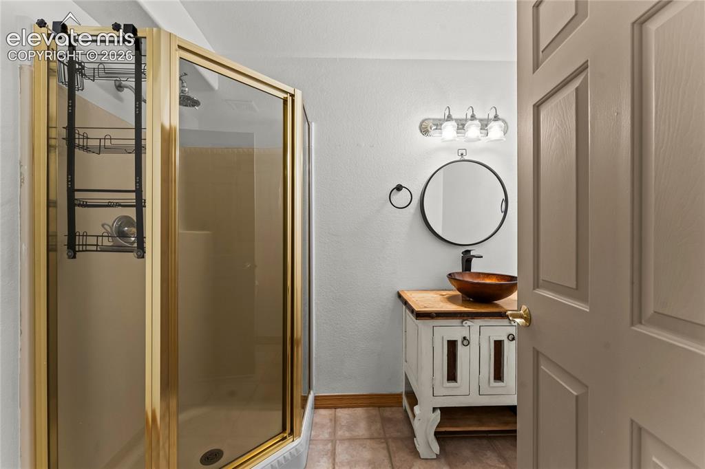 Image 30 of 43: Basement Bathroom