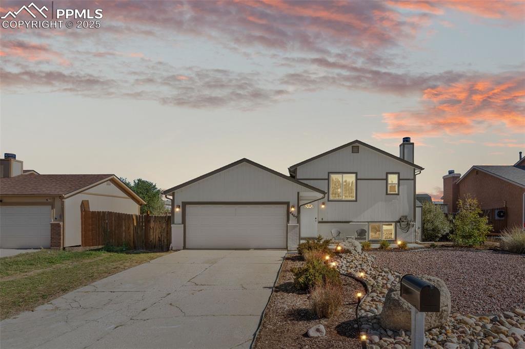 Image 35 of 38: Twilight enhanced photo of front of house