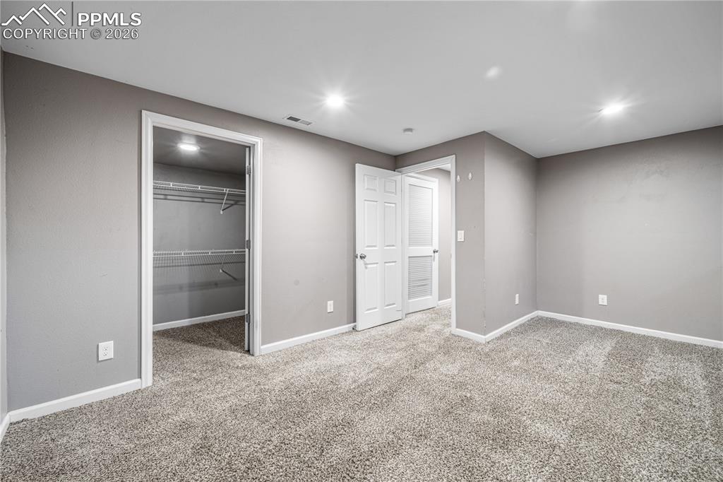 Image 28 of 33: Bedroom