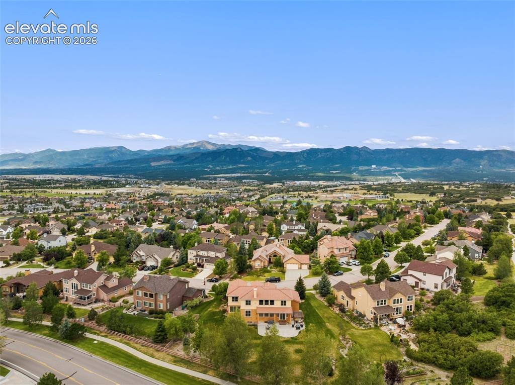 Image 4 of 47: Expansive aerial showcasing a residential neighborhood with varied architec