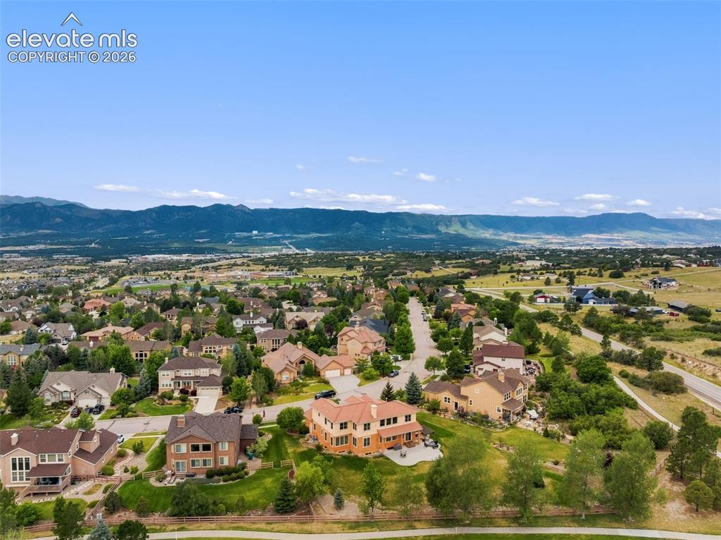 Image 5 of 47: Aerial perspective showcasing a residential area with varied architectural