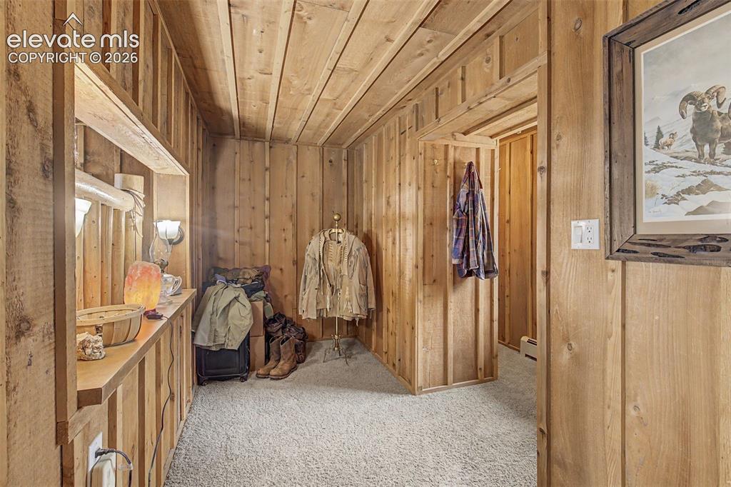 Image 17 of 34: Dressing area/primary closet