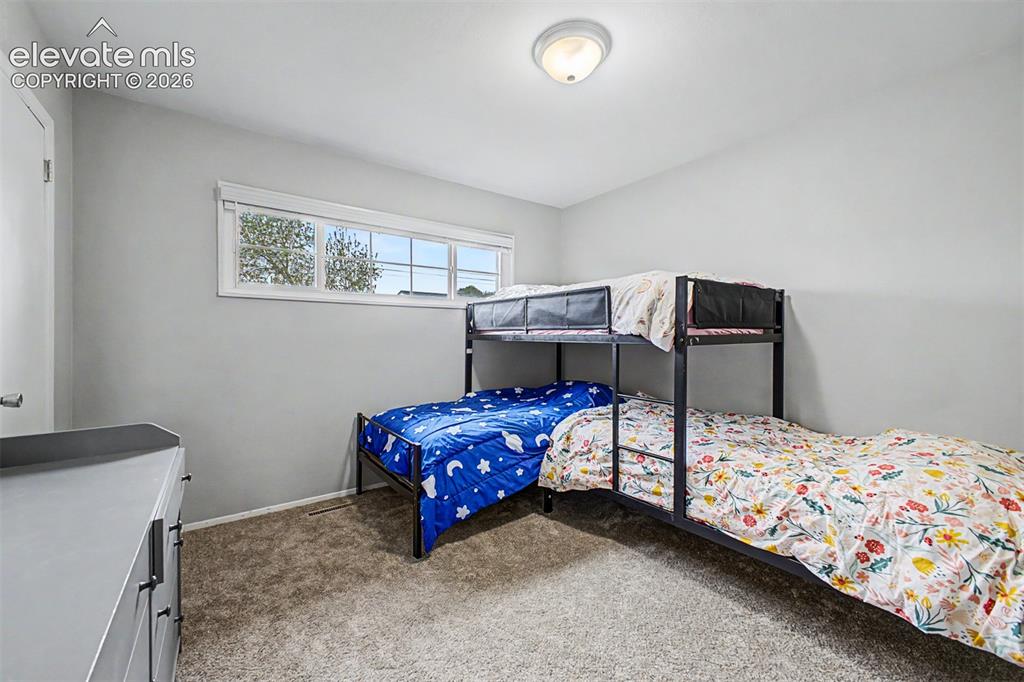 Image 18 of 28: Bedroom