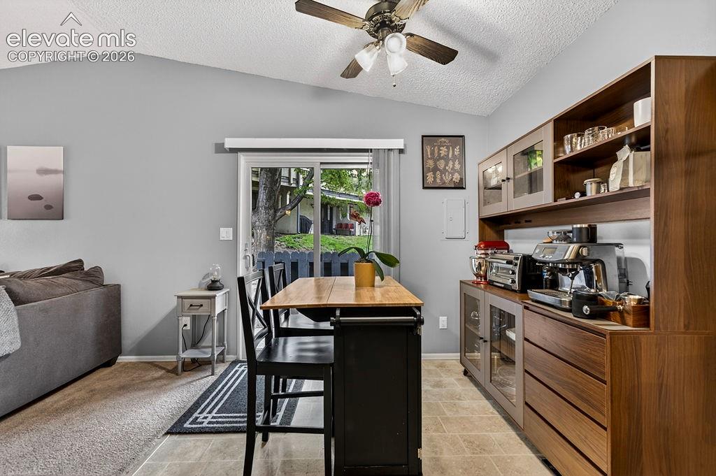 Image 14 of 50: Dining area, tiled flooring