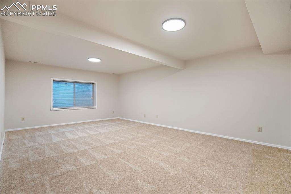 Image 37 of 50: Basement family room.