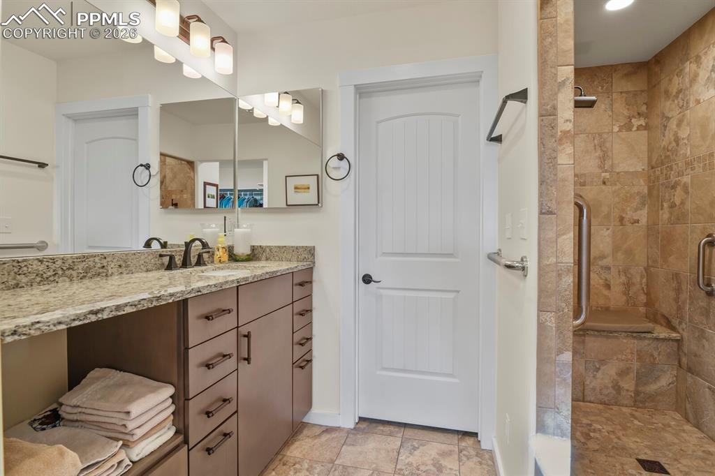 Image 28 of 50: Fully remodeled Primary Bathroom Suite with double vanities each in their o