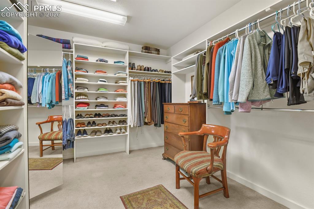Image 30 of 50: This is the Walk-in Closet for the Primary Bedroom Suite.  Lots of shelving