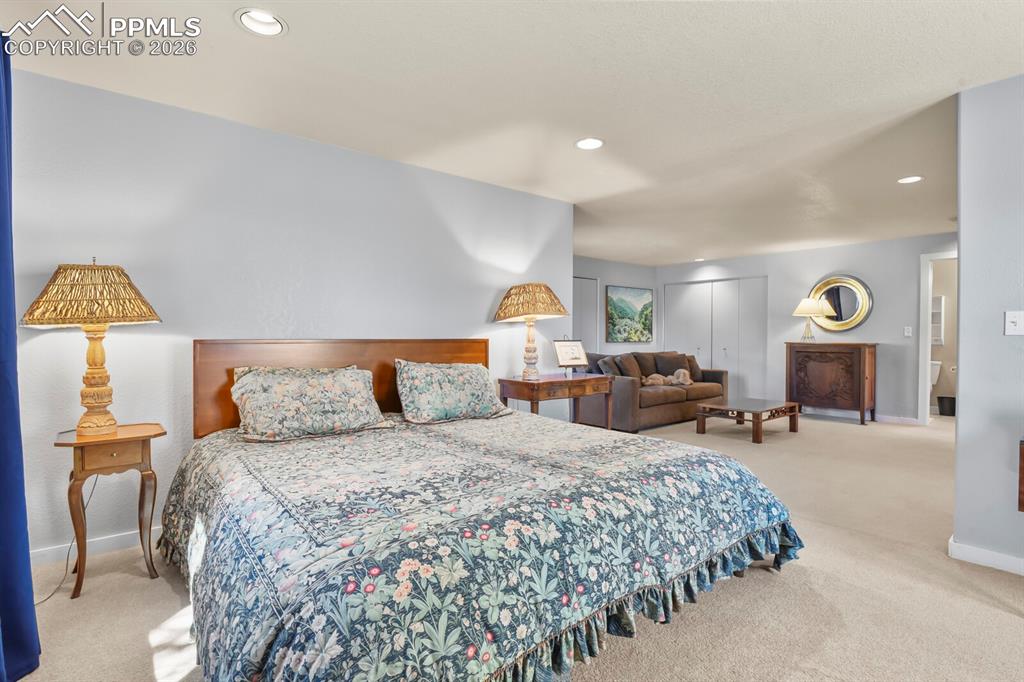 Image 38 of 50: Another view of the secondary bedroom suite looking into the sitting area a