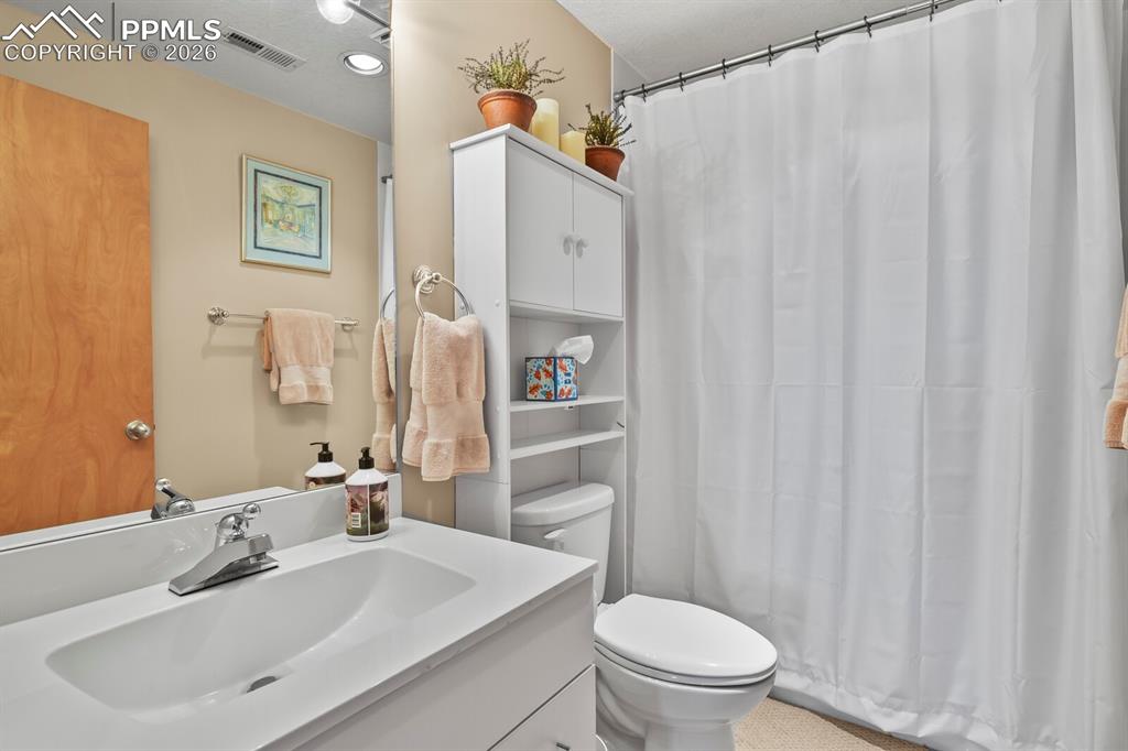 Image 41 of 50: 2nd bathroom in the lower level.