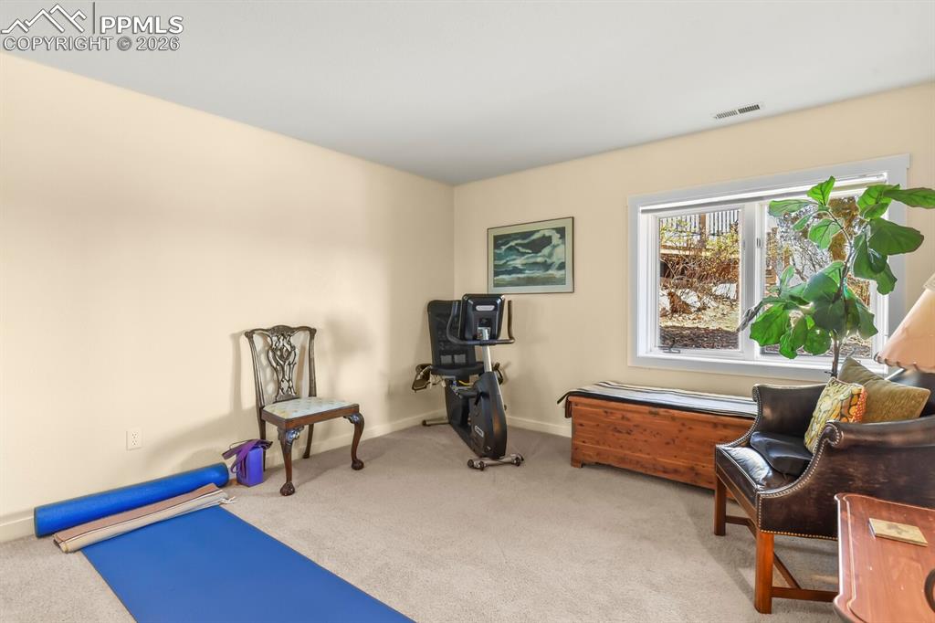 Image 42 of 50: 4th bedroom, currently exercise/yoga room.  