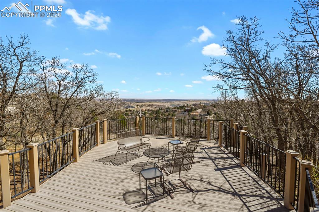 Image 44 of 50: Another view of the deck, Trex composite and beautiful wrought iron railing