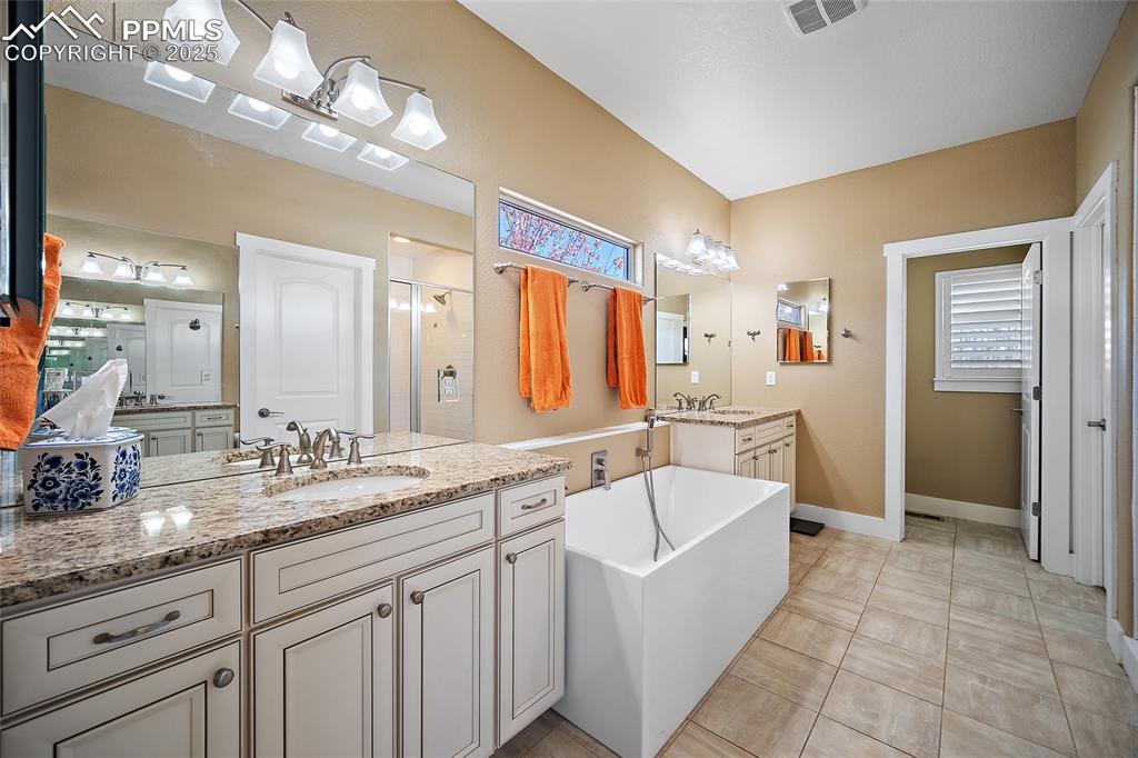 Image 19 of 47: Master Bathroom