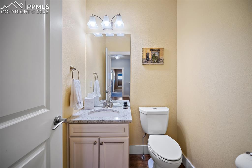 Image 24 of 47: Main level powder room