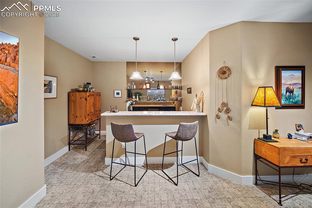 Image 28 of 47: Wet Bar with Frig