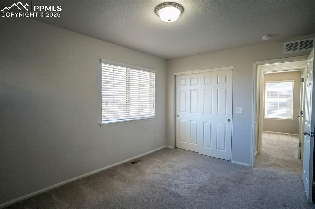 Image 22 of 37: Bedroom