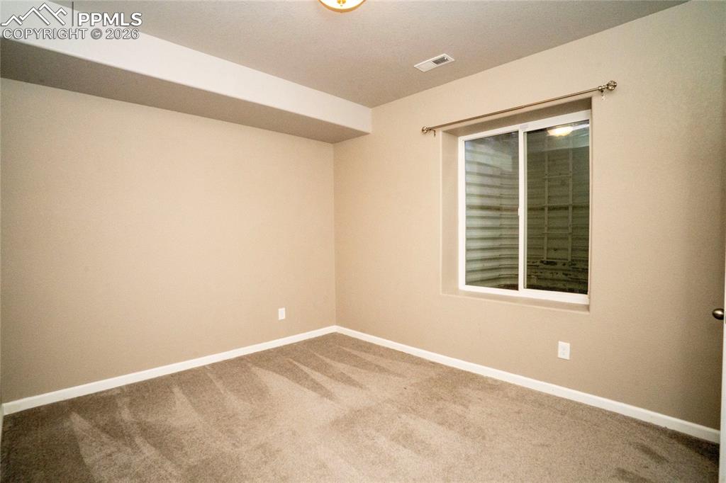 Image 41 of 50: basement, 4th bedroom