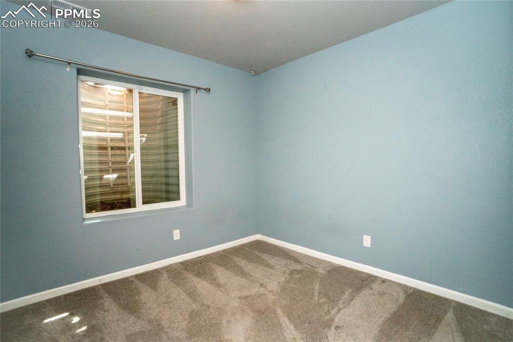 Image 44 of 50: basement, 5th bedroom