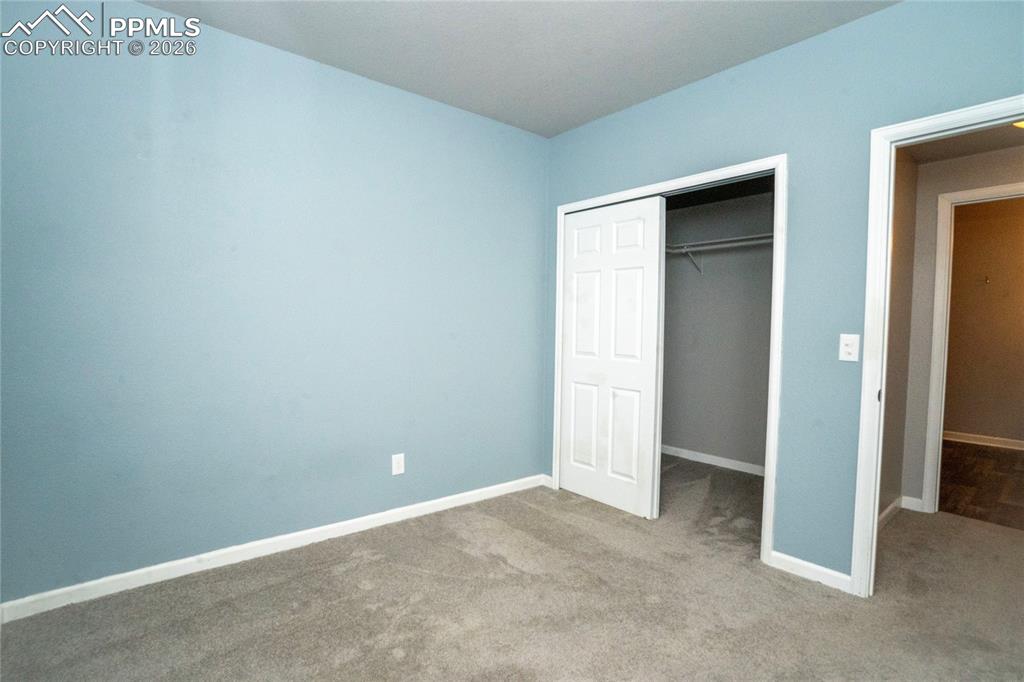 Image 45 of 50: basement, 5th bedroom