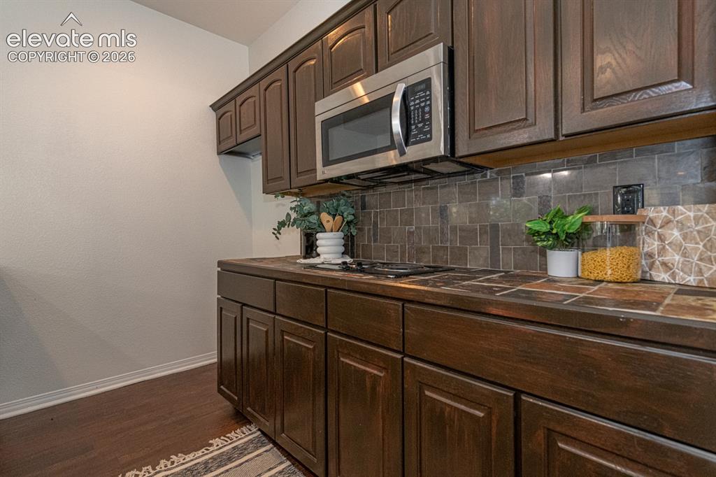Image 37 of 50: Basement wet bar / kitchenette