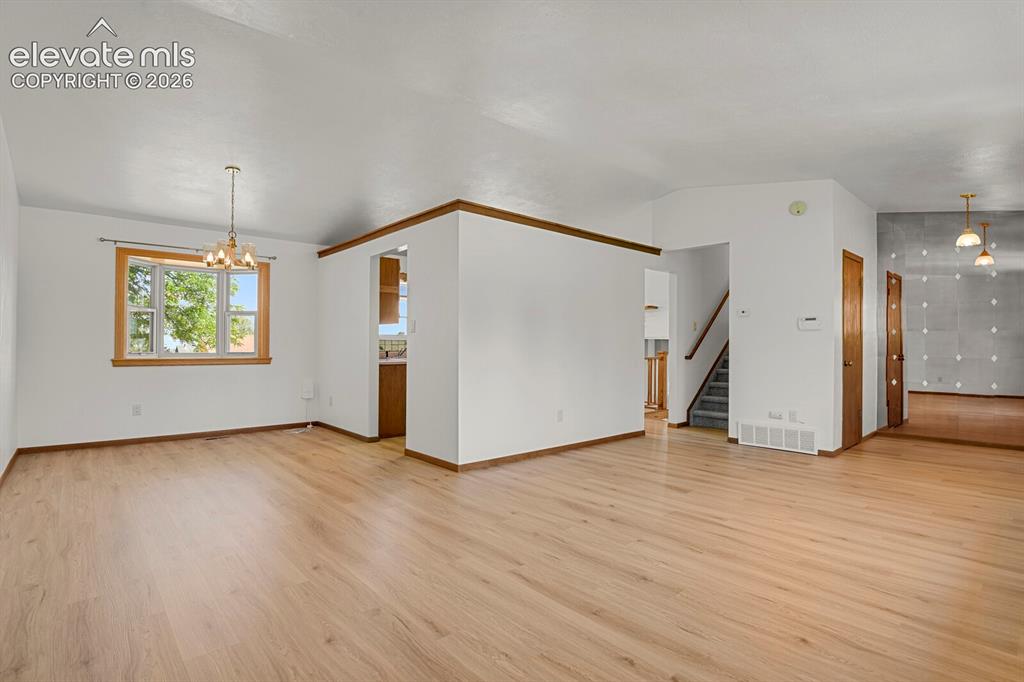 Image 4 of 19: Front LR and Dining area