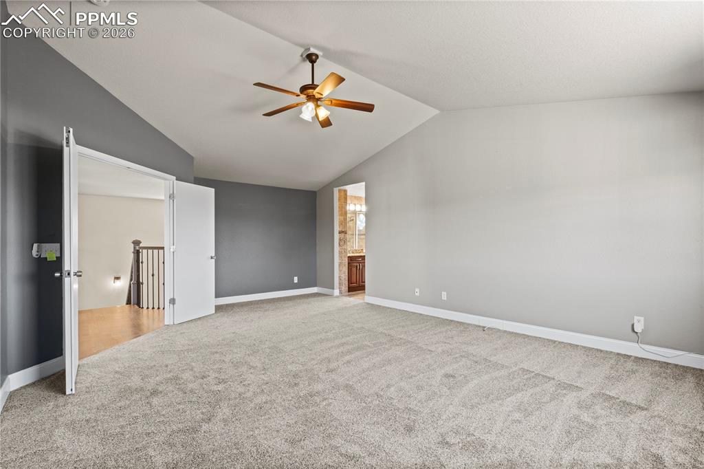 Image 22 of 49: Large Primary with Epic Pikes Peak Views and New Carpet.