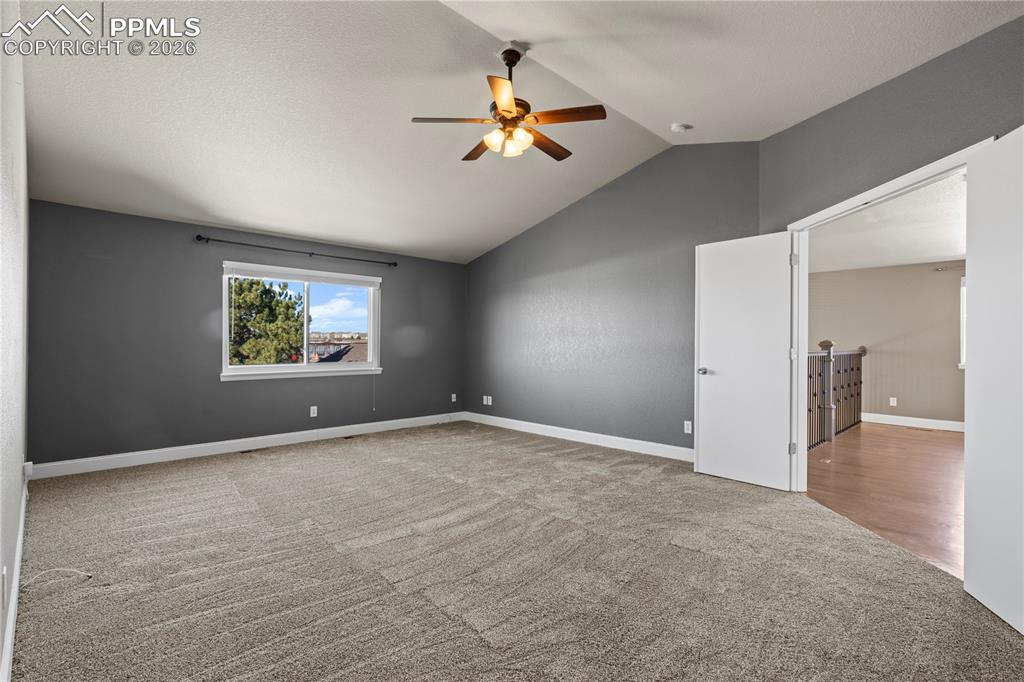 Image 23 of 49: Large Primary with Epic Pikes Peak Views and New Carpet.