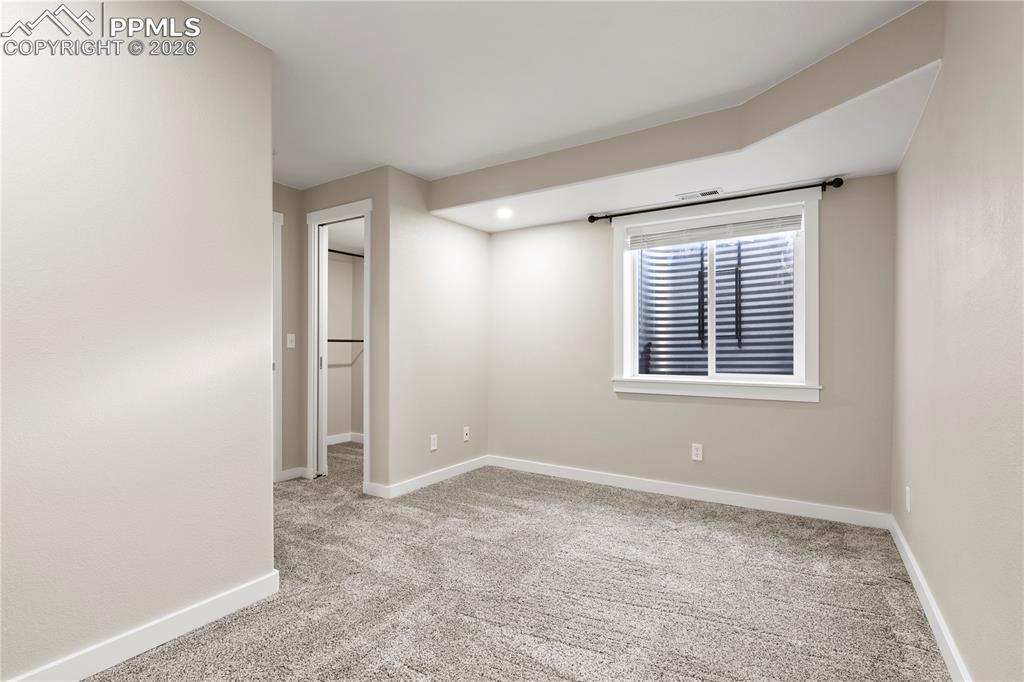 Image 40 of 49: Basement Bedroom 1