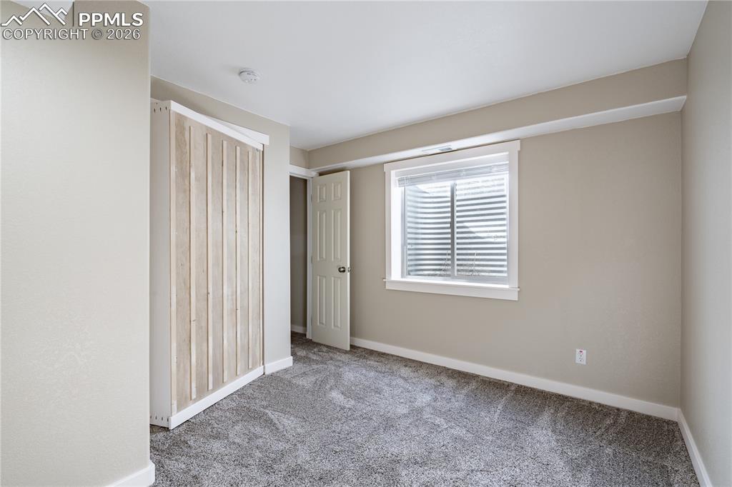 Image 41 of 49: Basement Bedroom 2