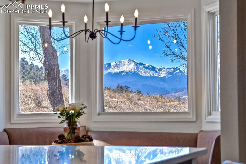 Image 19 of 49: Dining room with a mountain view