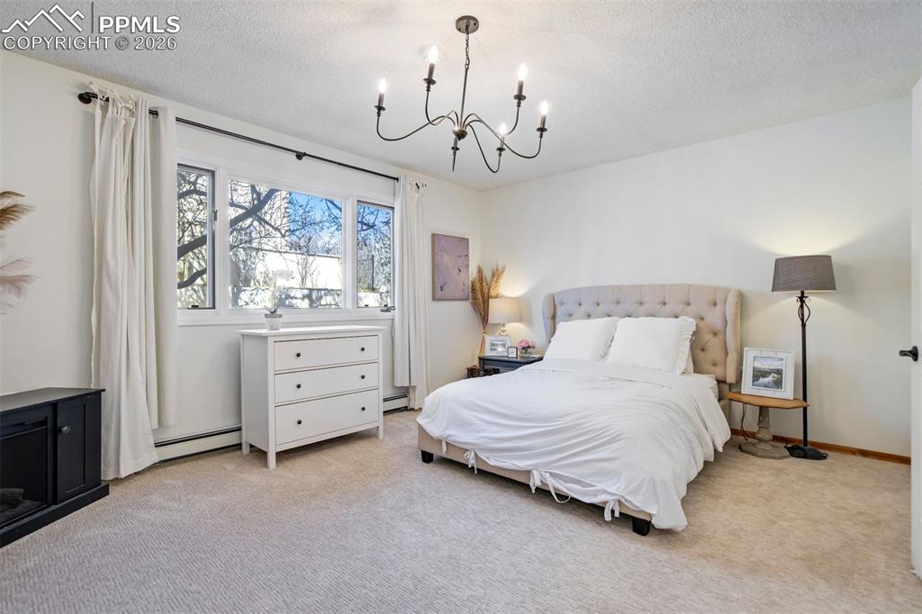 Image 36 of 49: Basement Bedroom #5  is large and features a great Harry P closet.