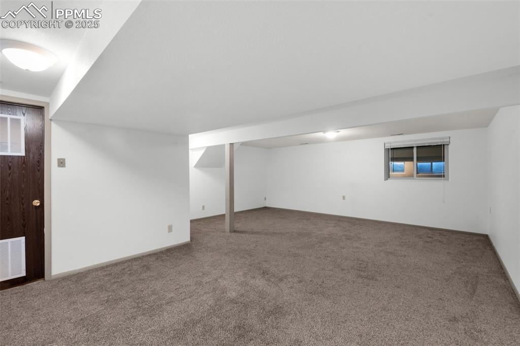 Image 27 of 49: Finished basement