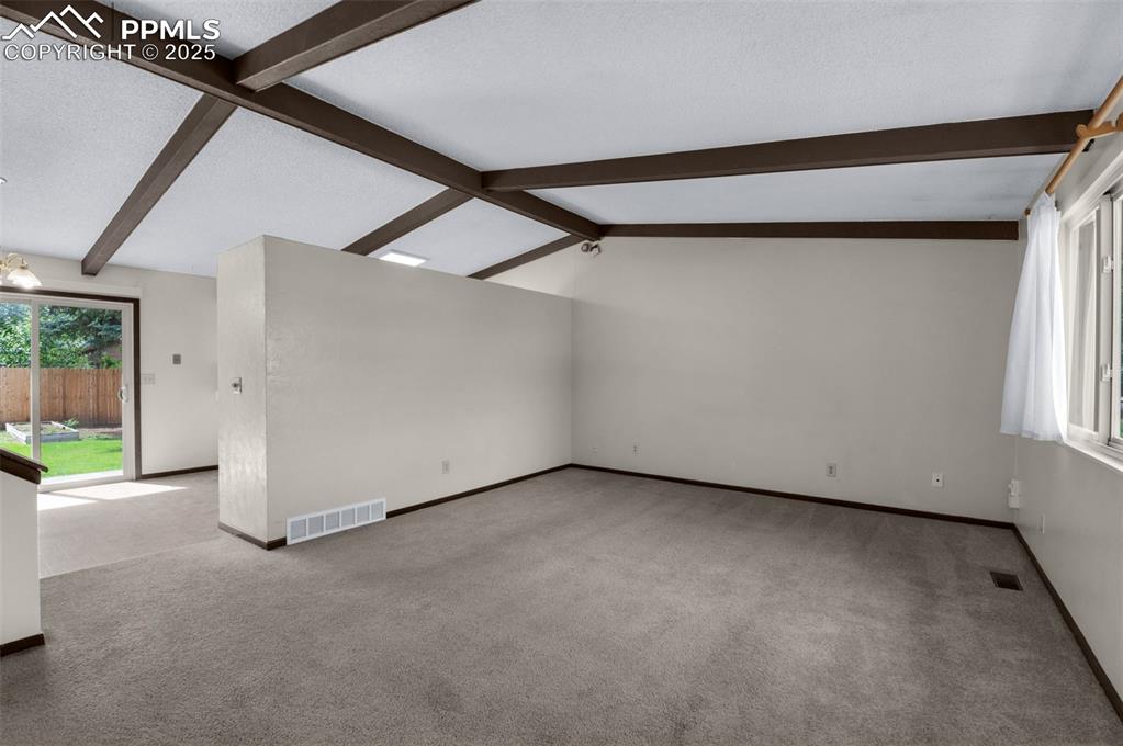 Image 4 of 49: Open floor plan, neutral colors, nice condition