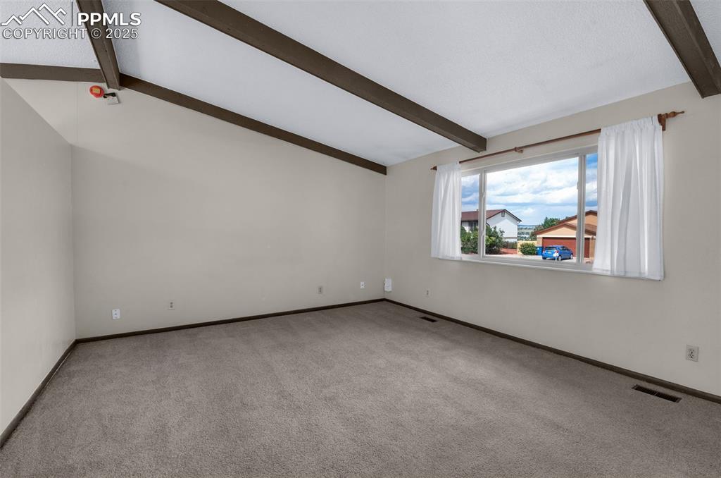 Image 6 of 49: bright and cheerful living room