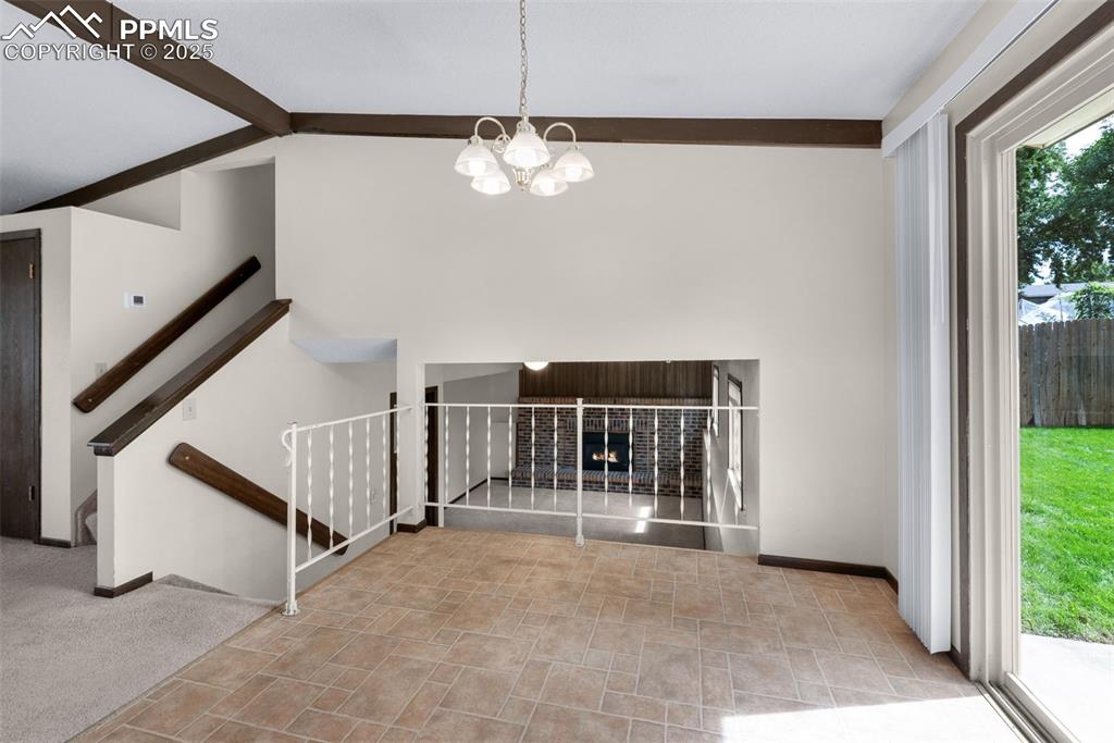 Image 7 of 49: Dining area off kitchen looking into family room