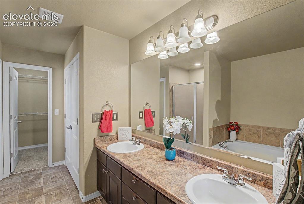 Image 21 of 42: Double Sinks at Bathroom Vanity