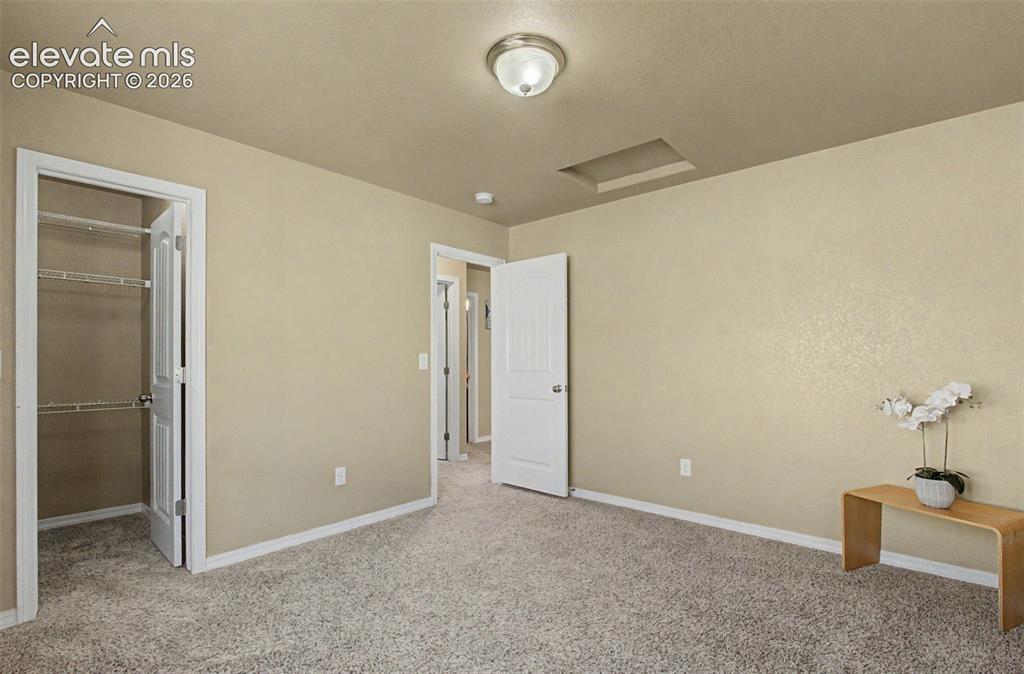 Image 31 of 42: Bedroom 3 with Walk-In Closet