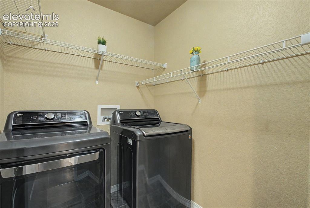 Image 37 of 42: Laundry Room next to Primary Bedroom