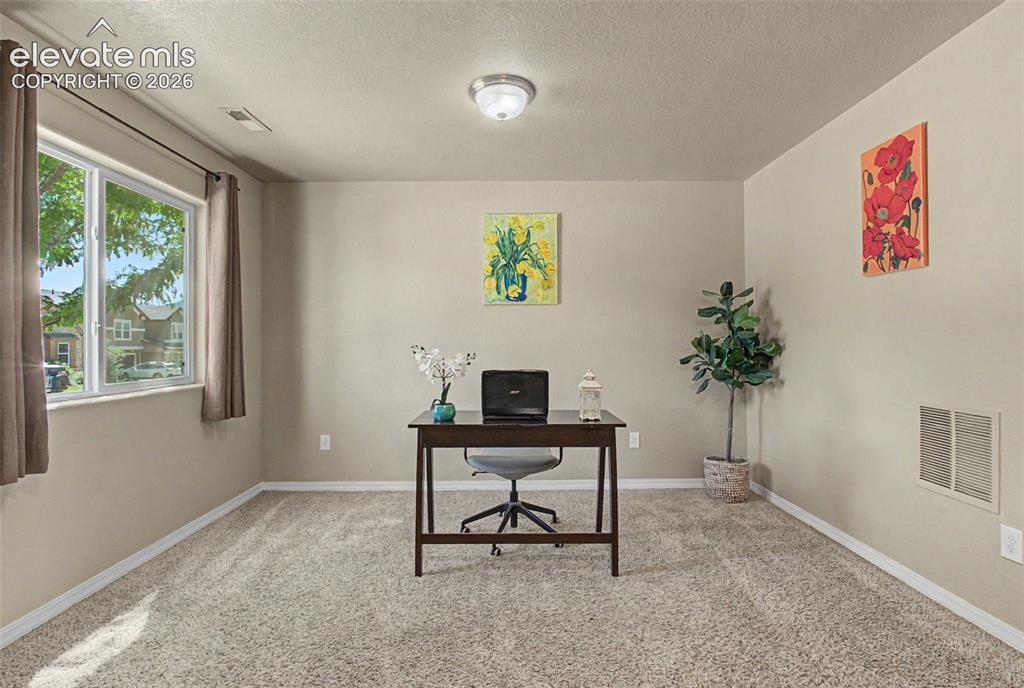 Image 4 of 42: Flex Space at Front Entryway
