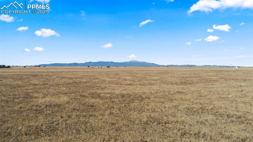 Image 19 of 19: View of mountain background with rural landscape