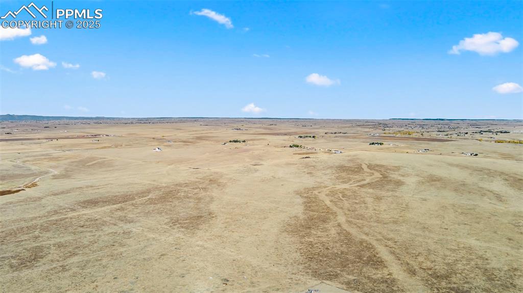 Image 9 of 19: View of rural area with a desert landscape