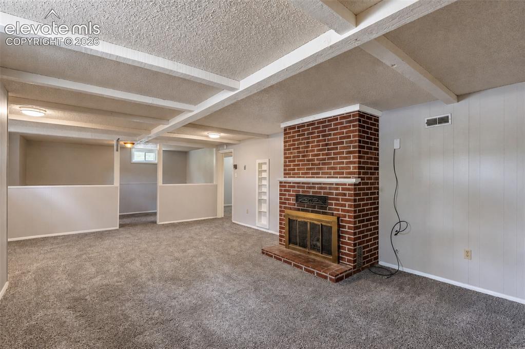 Image 31 of 50: Second living room - basement