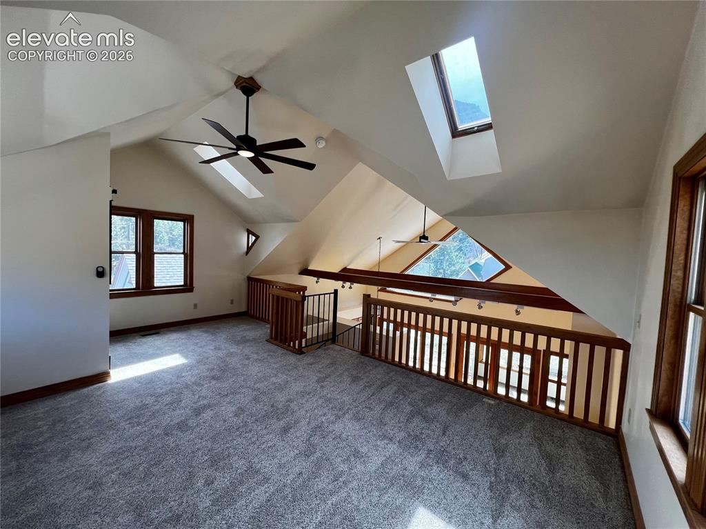 Image 17 of 45: Custom Cottage: All new lighting and ceiling fans, new paint and carpet