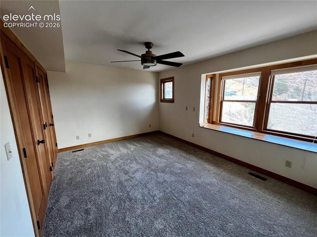 Image 19 of 45: Custom Cottage: Main level bedroom with great views like every room in this