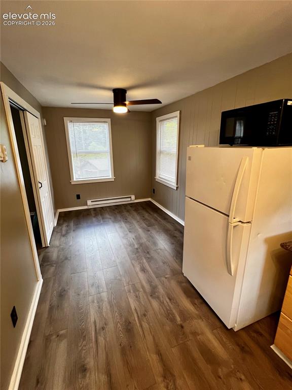 Image 24 of 45:  Upper Apt: All new laminate flooring and all appliances stay