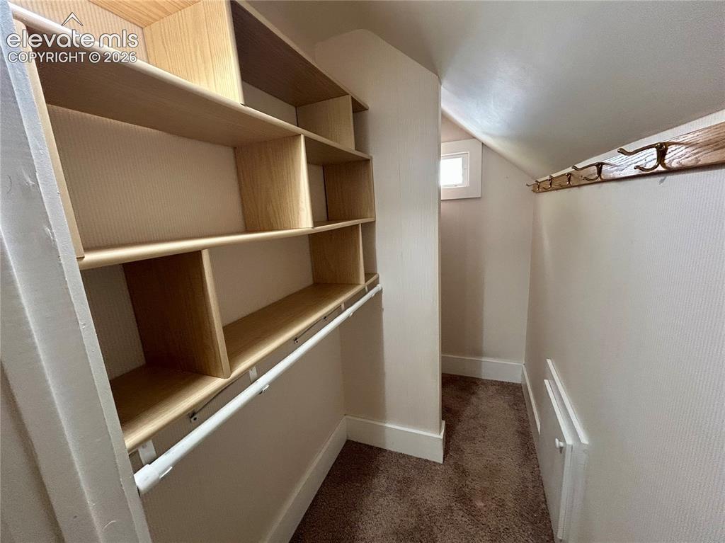 Image 35 of 45: Main House/602: Upstairs hallway bonus closet for linens, clothing or addit