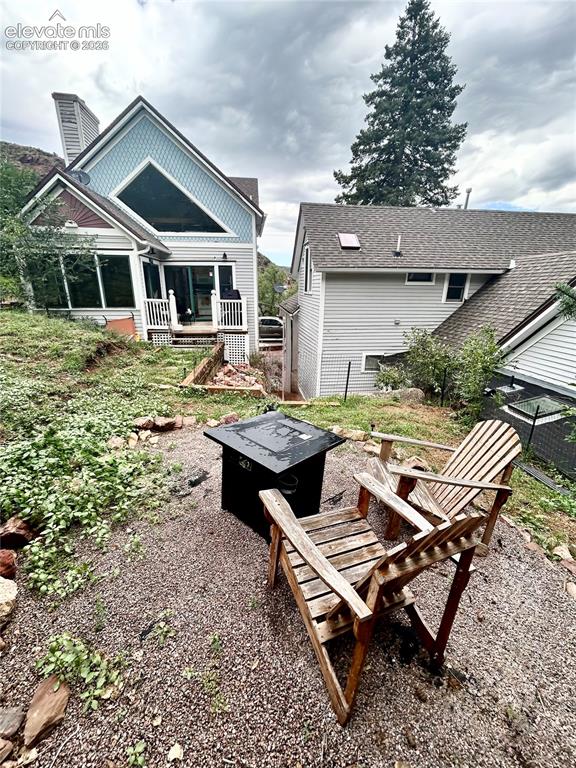 Image 4 of 45: Rear view of the 3 Hydro Custom cottage on the left and the Main Victorian